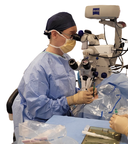 Dr John Chang performing eye surgery